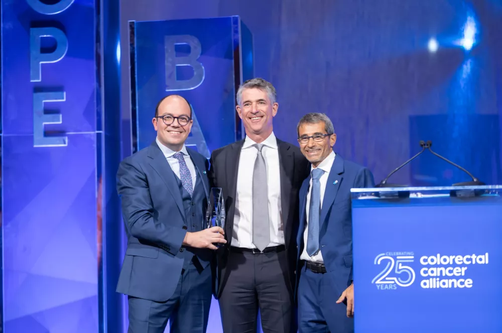 Kevin Conroy, Chairman and CEO of Exact Sciences, accepts the Blue Star Award at the Blue Hope Bash.