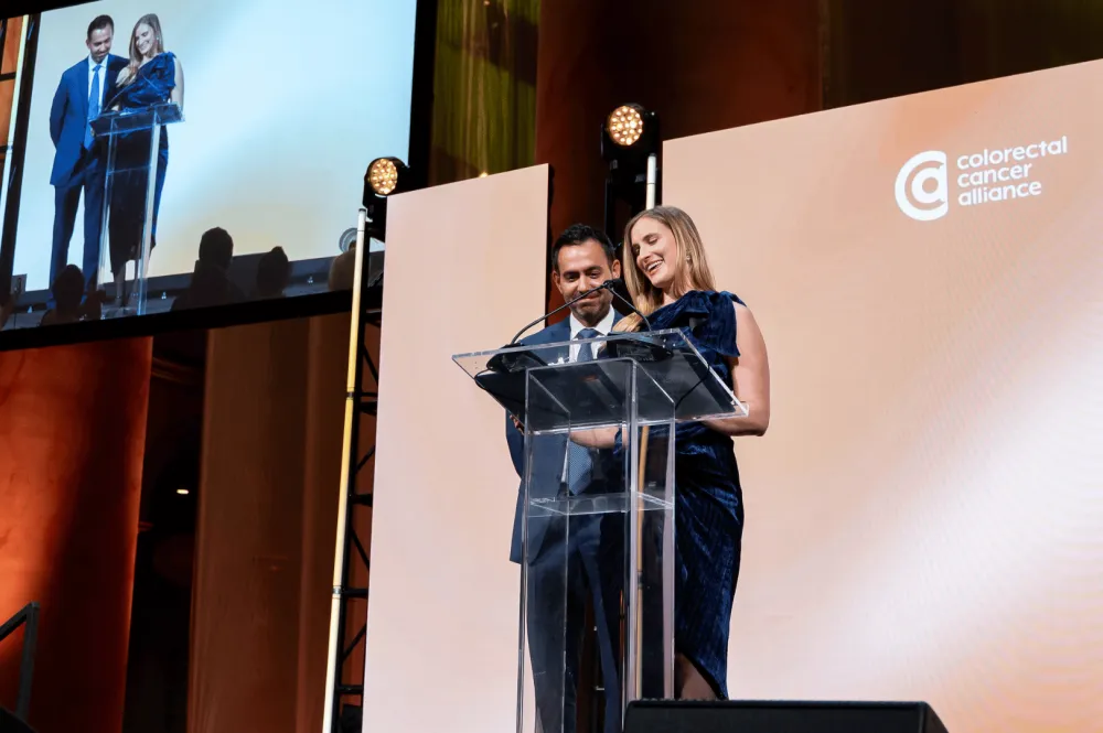 Event chairs Cory and Cayley Tull take the stage to share their personal connection to the mission and rally support for a cure.