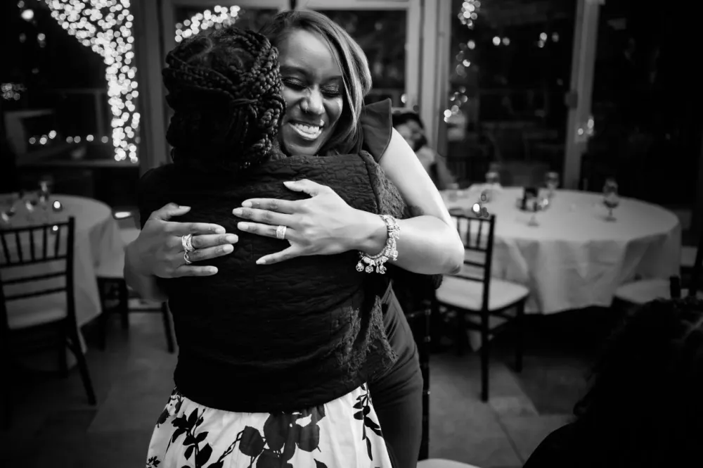 Attendees hugging at the 2026 Blue Hope Bash Chicago.