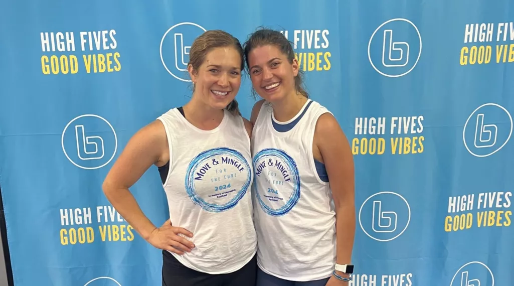 Volunteers Abby Bernhardt and Heather Potthast pose for the camera.