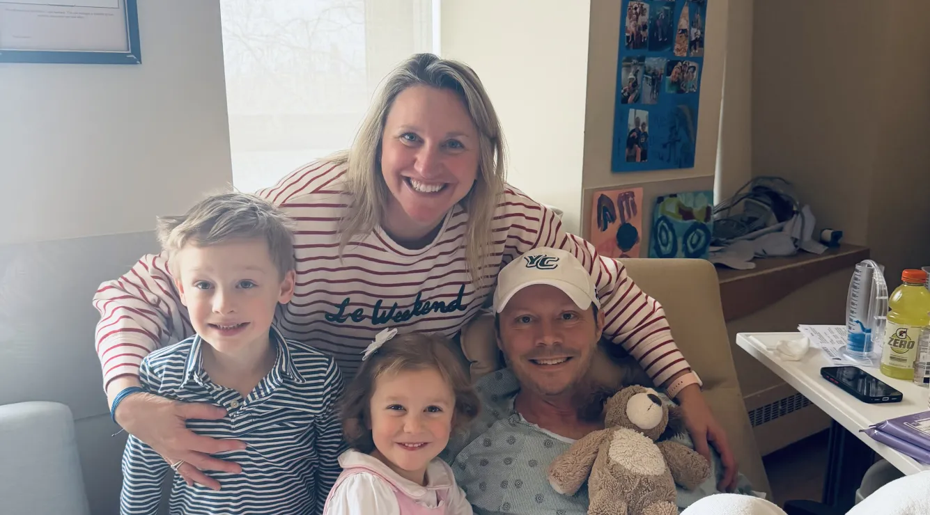 Man at hospital with family