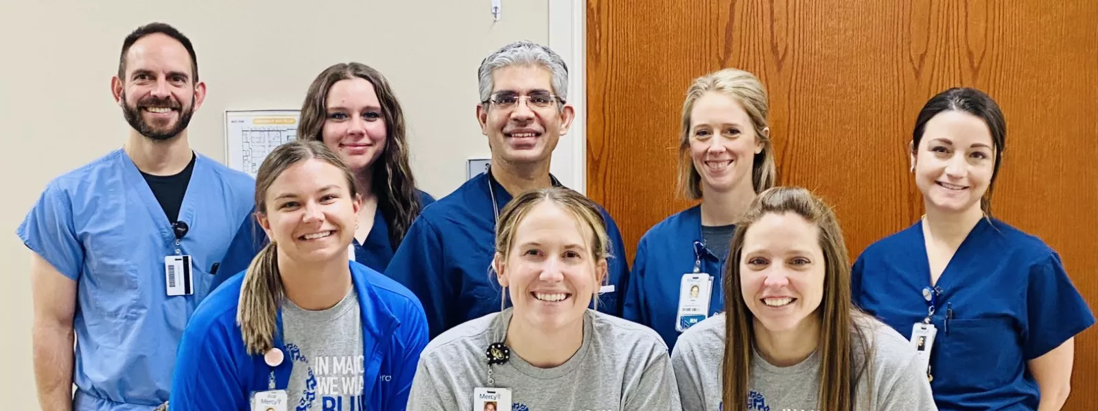 Medical staff dress in blue