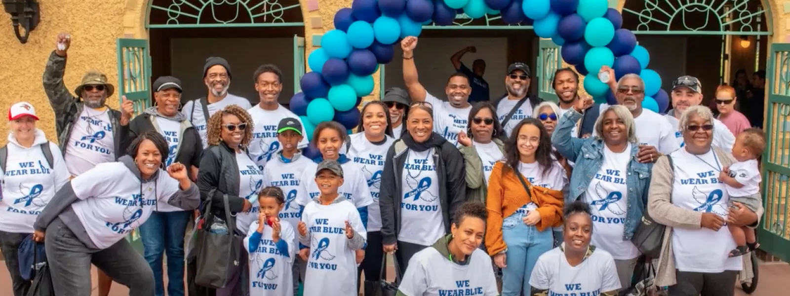 Walk to end colon cancer group of people celebrating