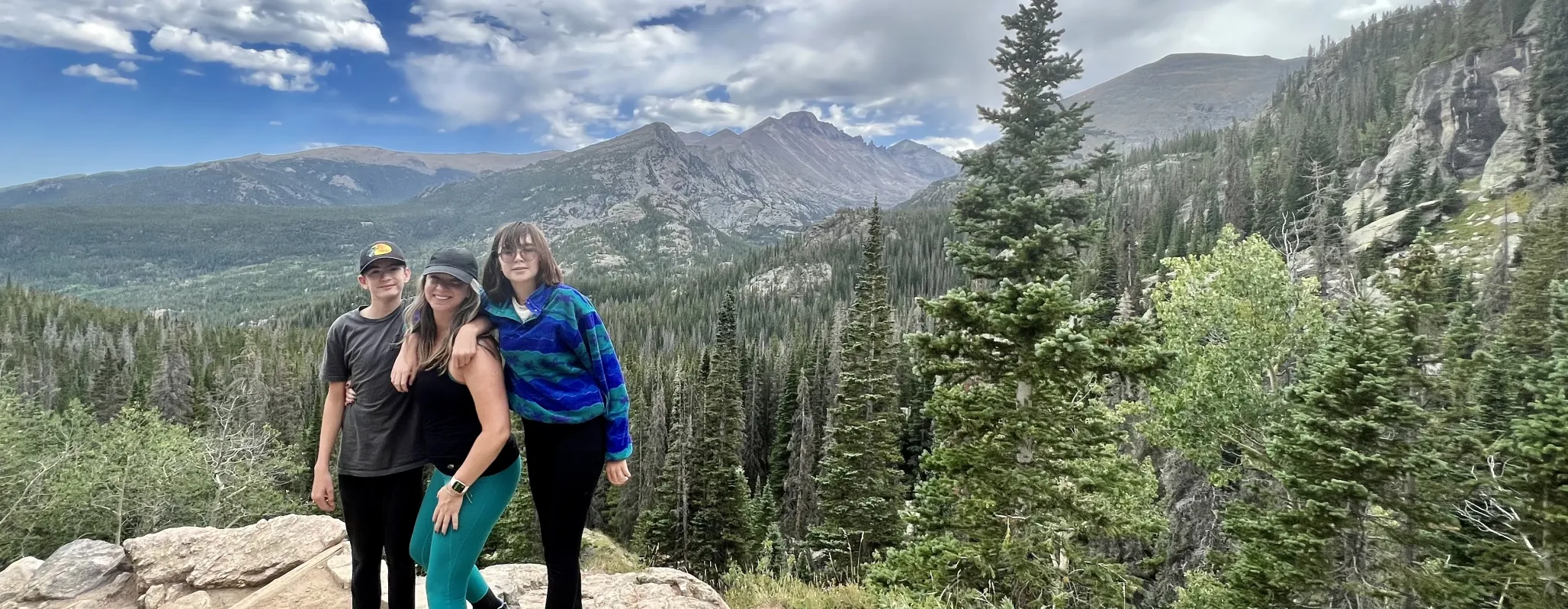 Family on mountainside