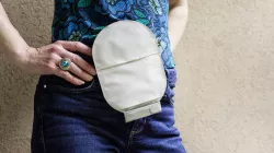 woman in blue with ostomy