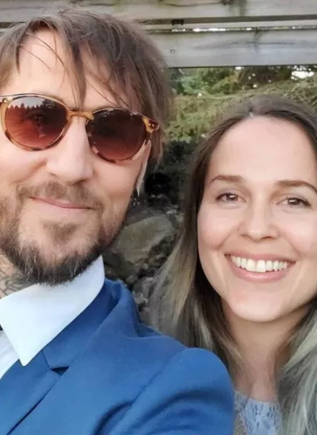 Dressy couple posing for selfie