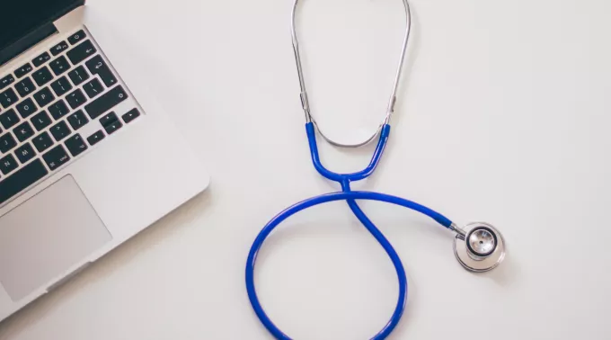 blue stethoscope with computer 