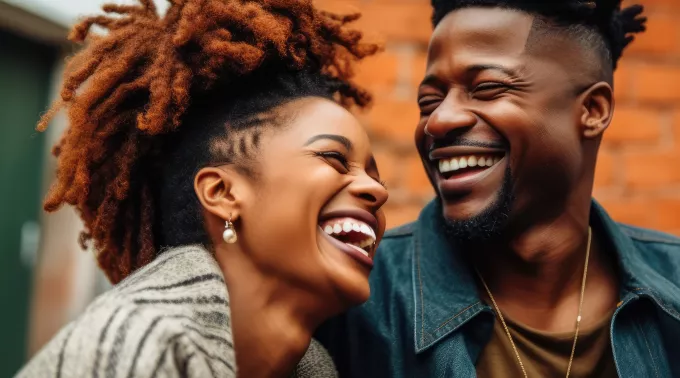 couple together laughing 