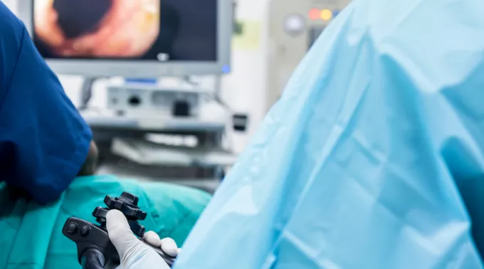 person getting colonoscopy with scope