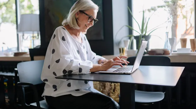 woman sitting at laptop
