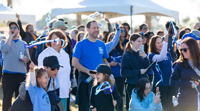 Walk cheering starting off the walk