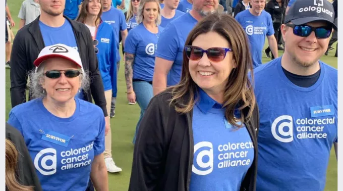 Walk participants with blue shirts
