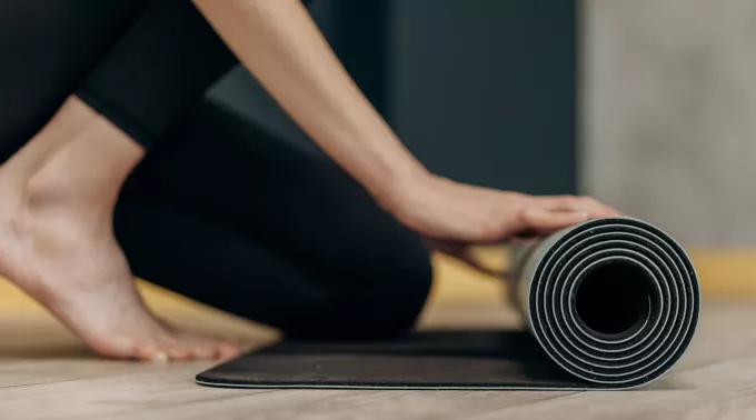 yoga mat unrolling