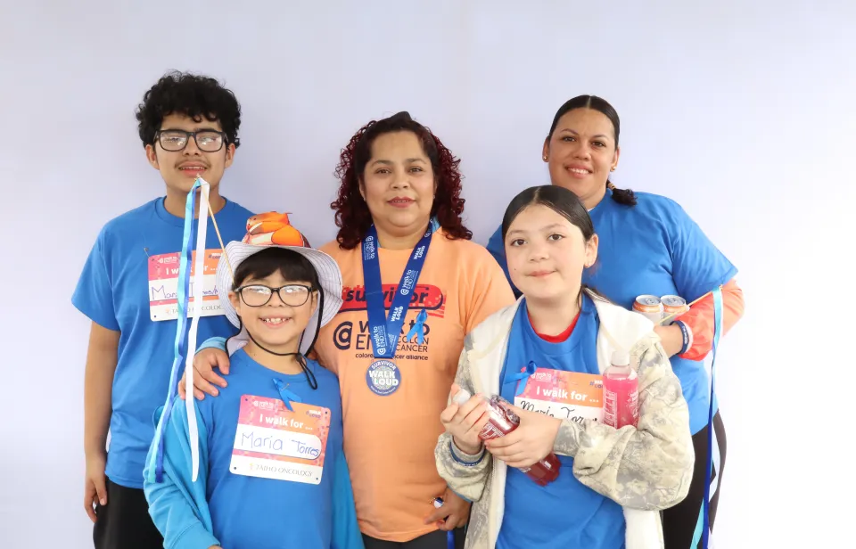 Family at Walk to End Colon Cancer with medals