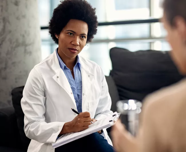 female healthcare provider giving a consultation