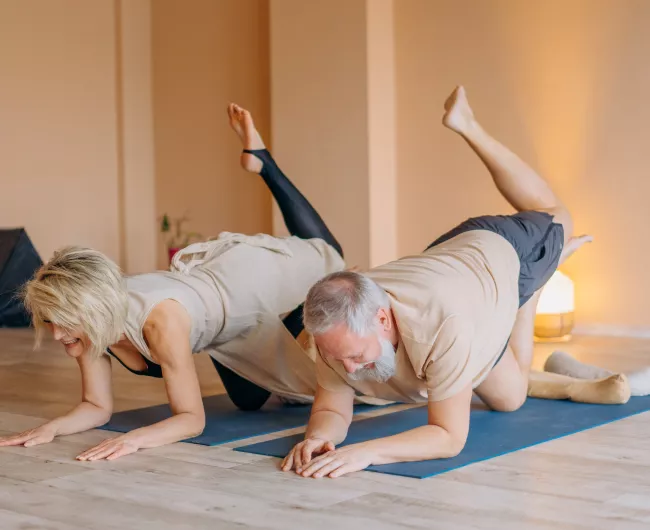 couple doing floor exercise