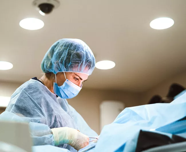 female doctor in blue gown