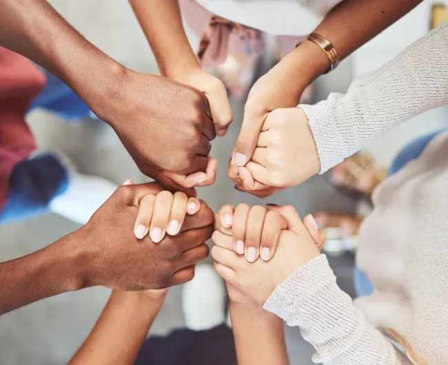 group holding hands