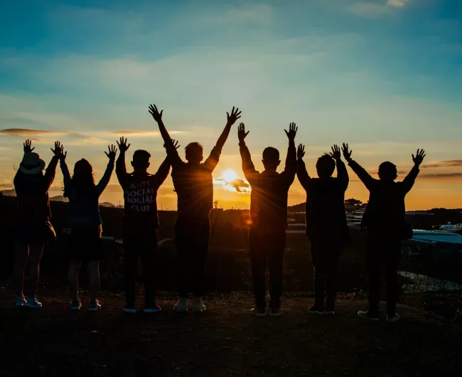 silhouette of group of people