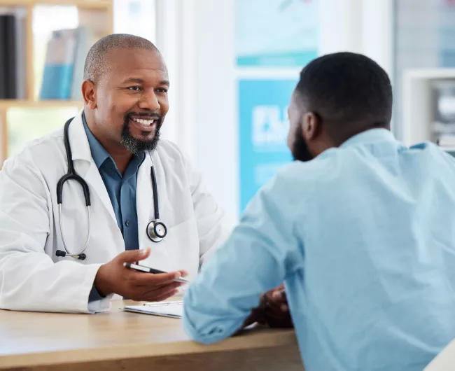 male patient with doctor in office