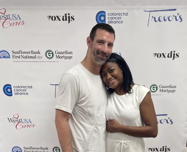 Mitch Comstein 2023 couple embrace