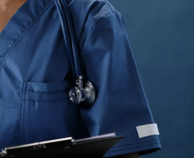 half screen healthcare worker with stethoscope