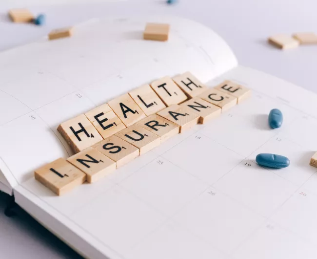 health insurance in scrabble letters