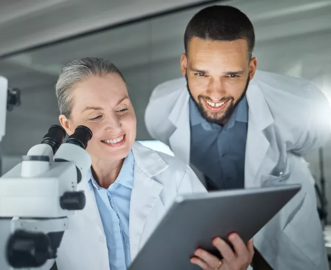 two researchers in lab