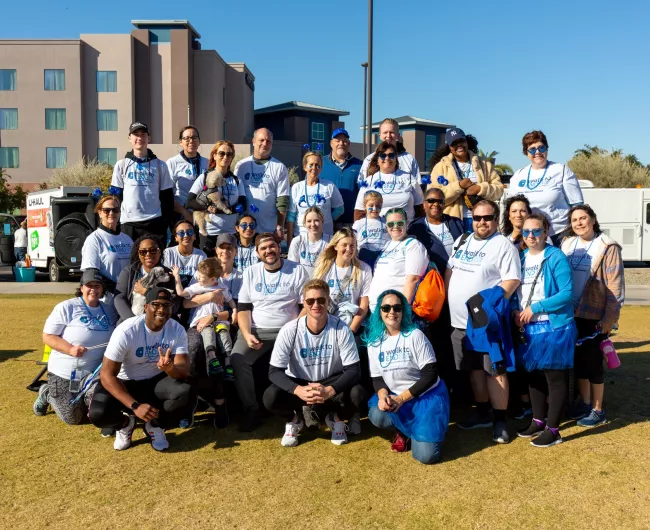 Large group smiling at walk