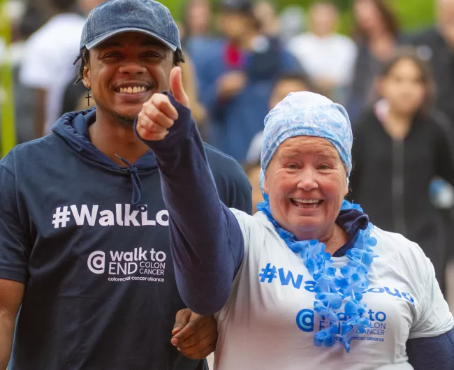 Walk man and woman thumbs up