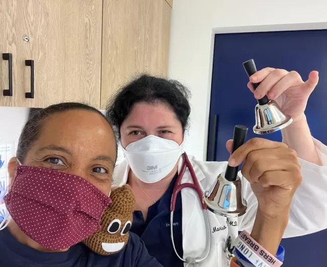 Black woman with female doctor