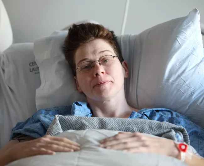 Woman in hospital bed