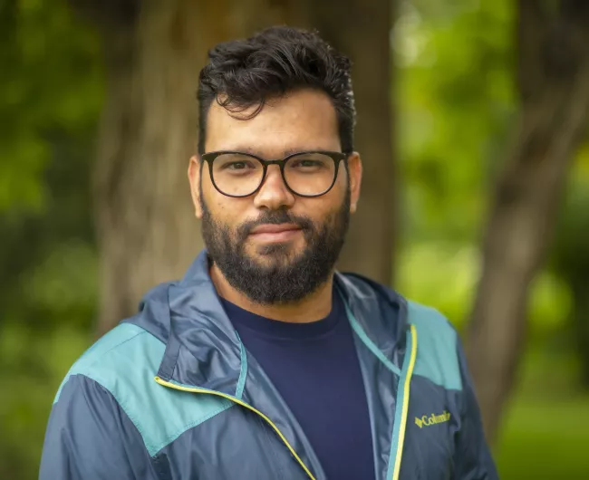 young man blue jacket