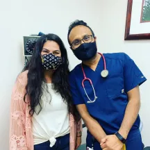 Latina woman with male doctor