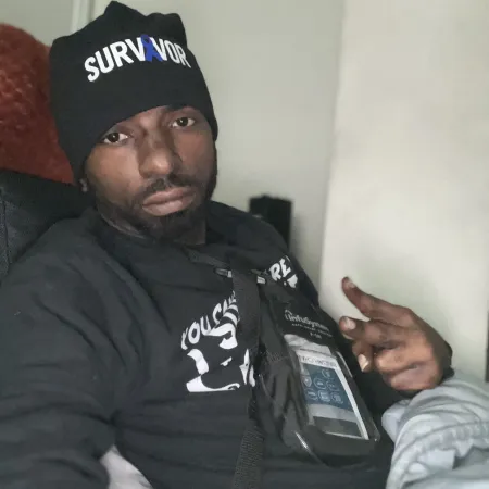Charles in Survivor hat