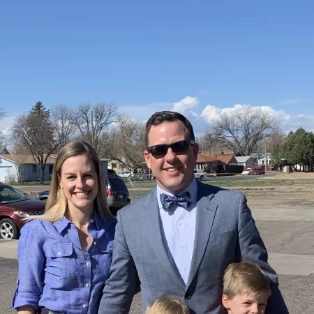 Jason embracing family