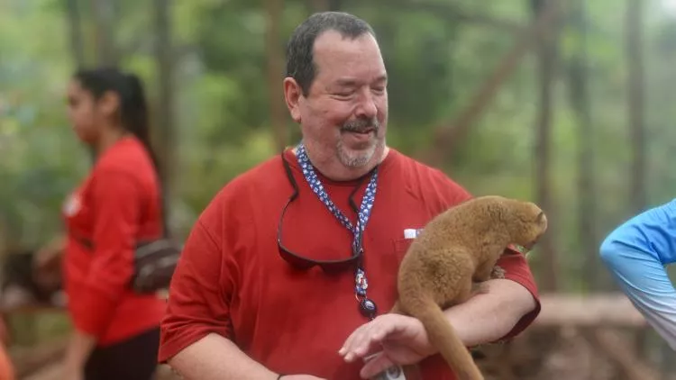 Man with lemur